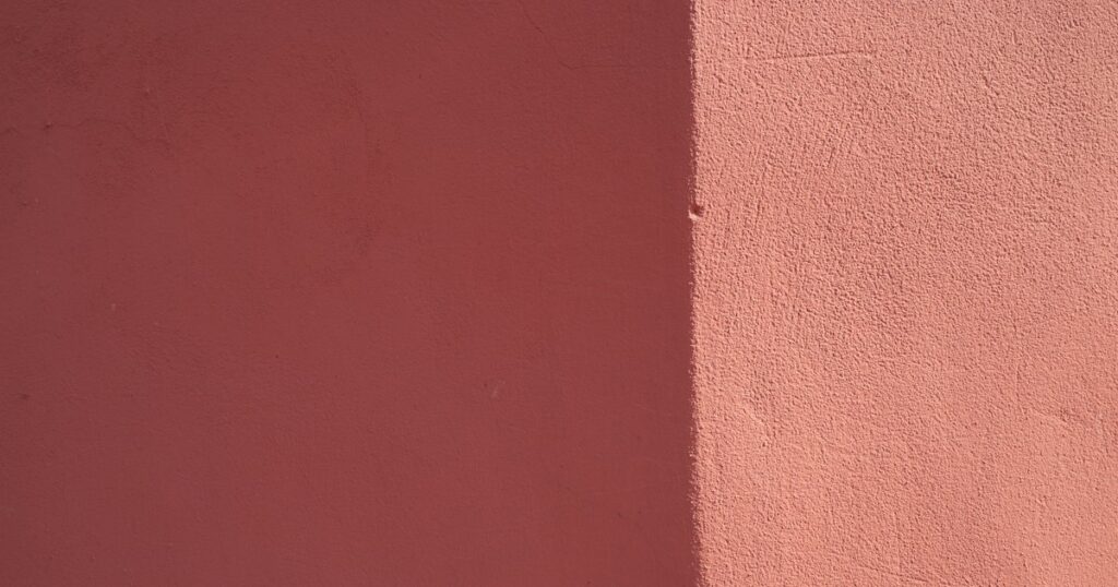One wall divided into two shades by a shadow