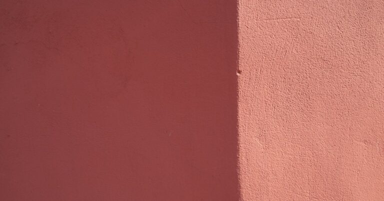 One wall divided into two shades by a shadow